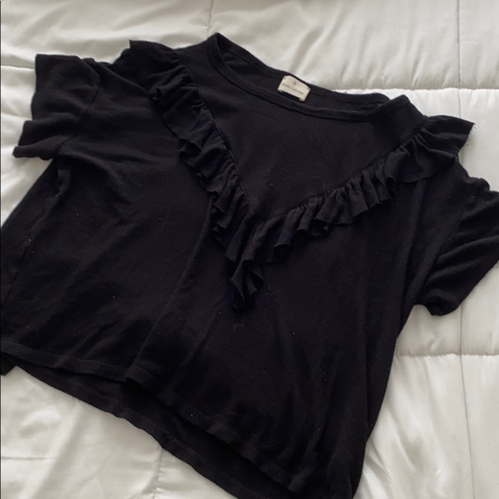 Oversized black ruffle top